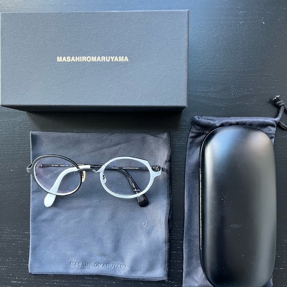 Masahiro Maruyama, black and white metal frames